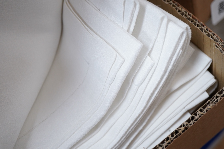 A collection of four sets of ten monogrammed French linen napkins and a similar set of twelve napkins, various odd sets of English Damask napkins, a large damask table cloth and a set of hand towels.